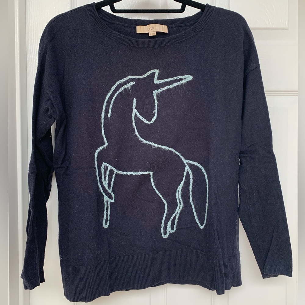 Navy sweater with unicorn embroidery
